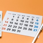 カレンダーと電卓のイメージ